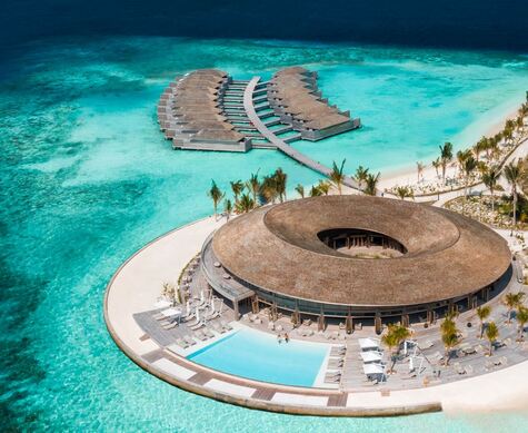 High end resort and spa in the Maldives with over water villas
