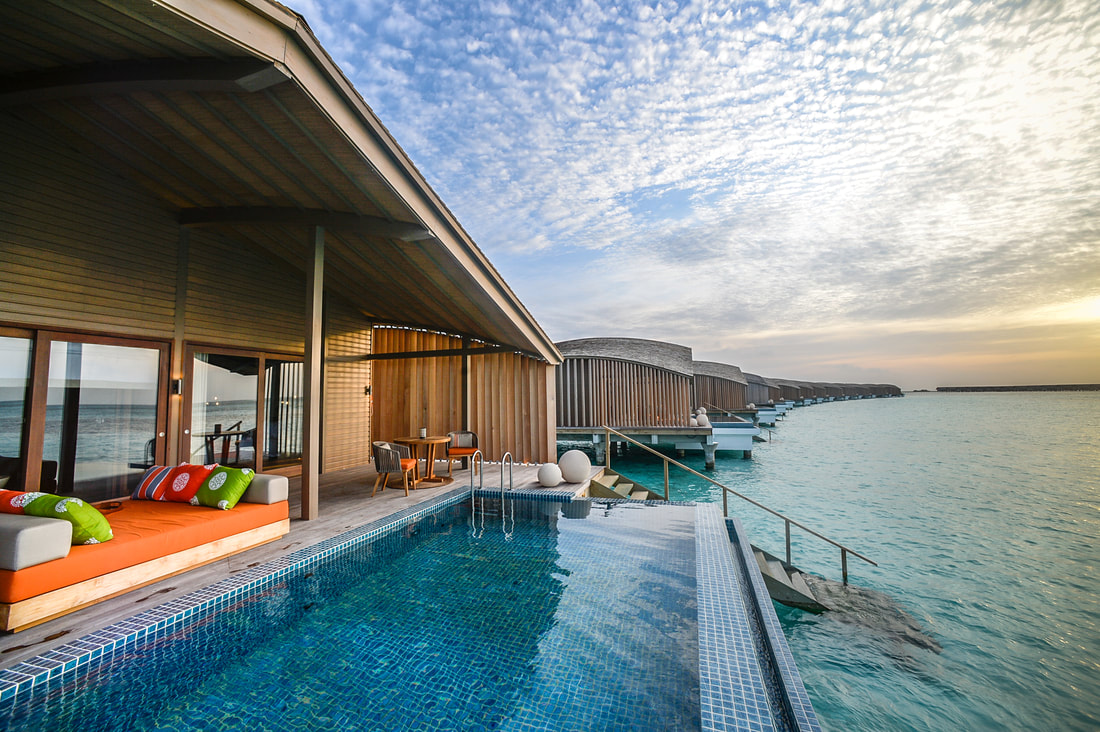 Contemporary architecture and Japanese design for luxury over water villas at a Maldives island resort which is fully sustainable