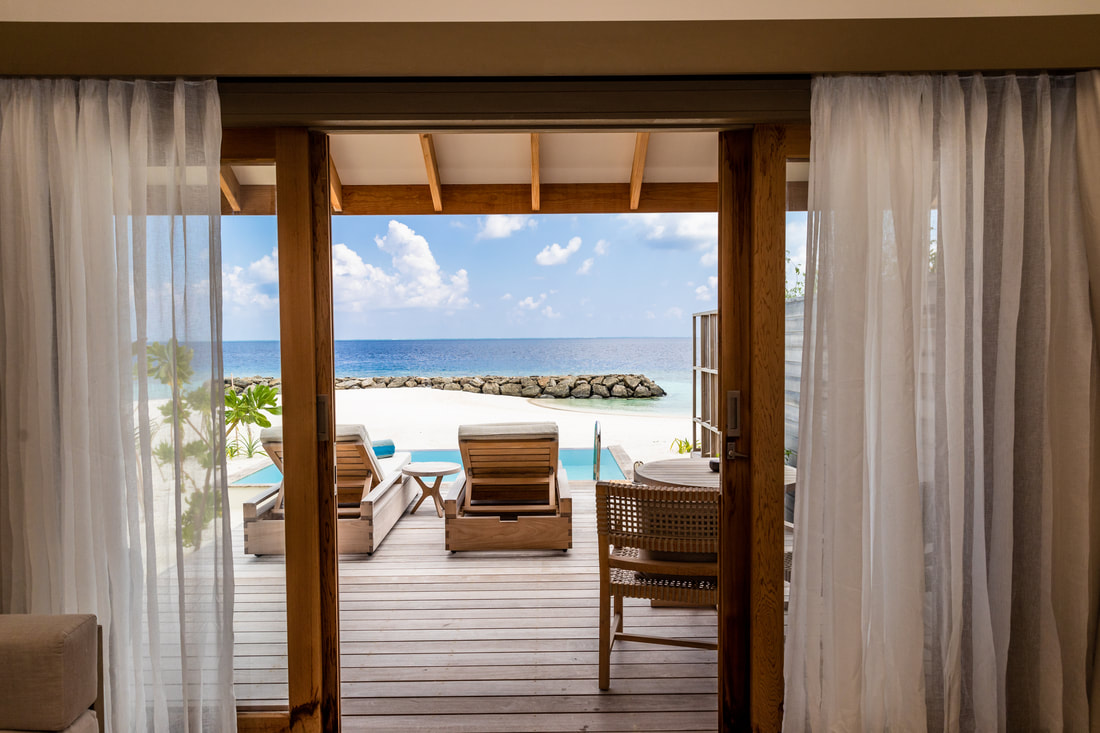 Luxury beach island resort villa overlooking the pristine ocean