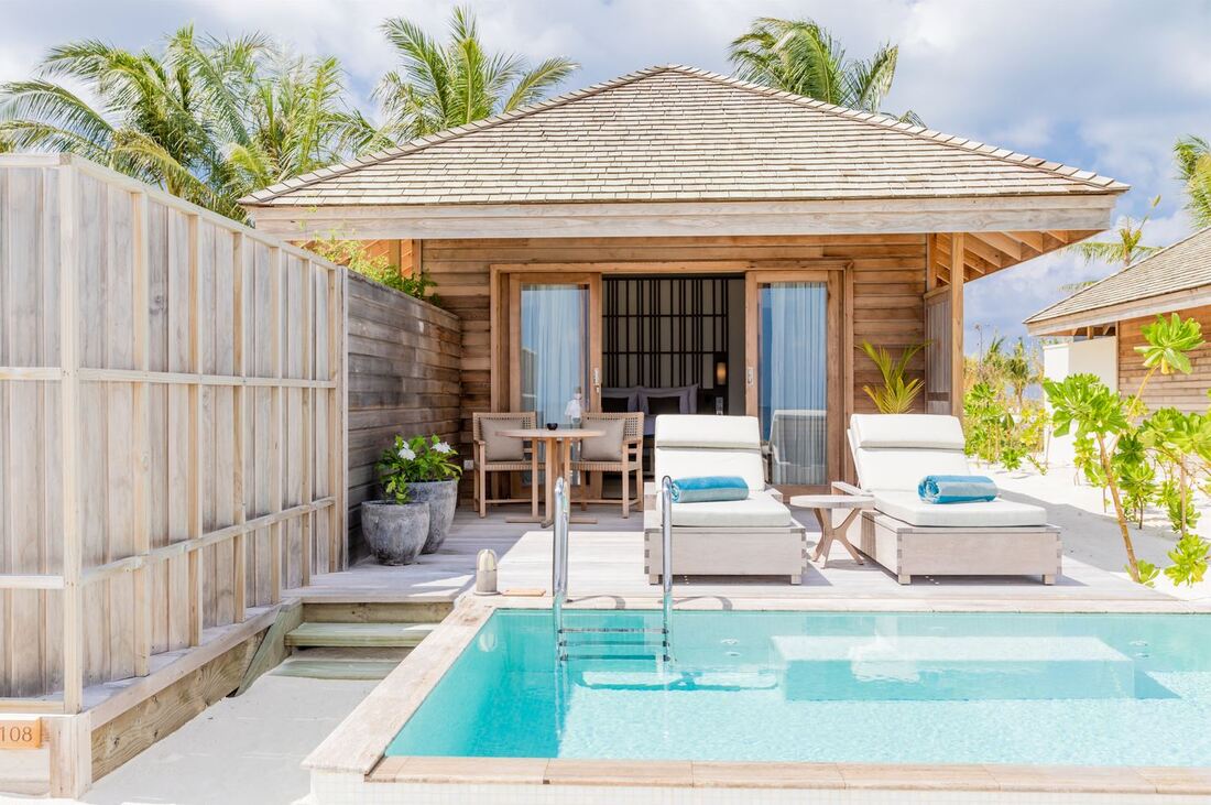 Luxury beach island resort villa with Japanese inspired natural architecture.