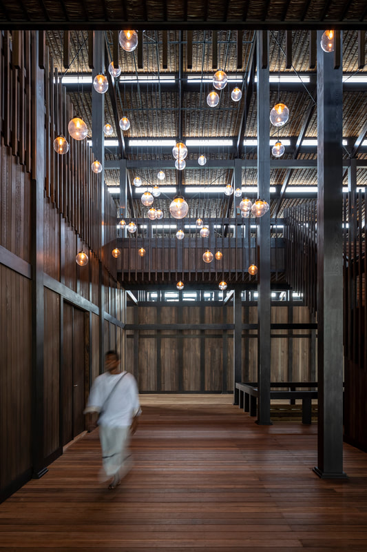Modern light pendants in a contemporary wood architecture