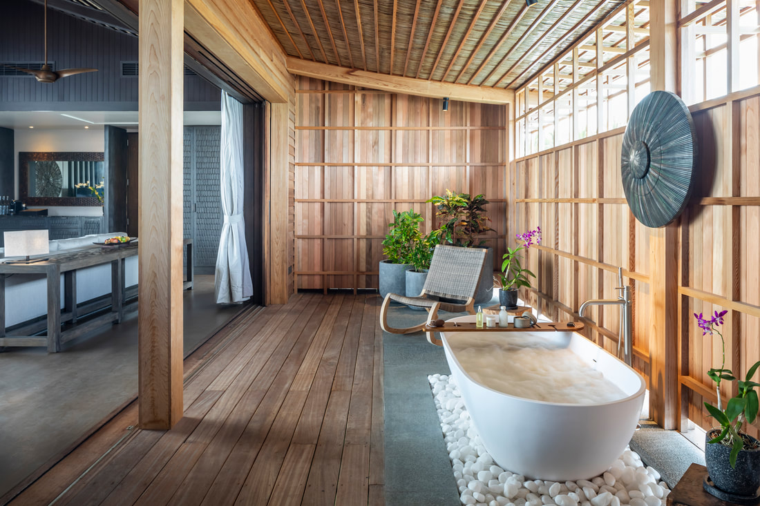 Modern bathroom design using natural wood elements evoking Japanese architecture