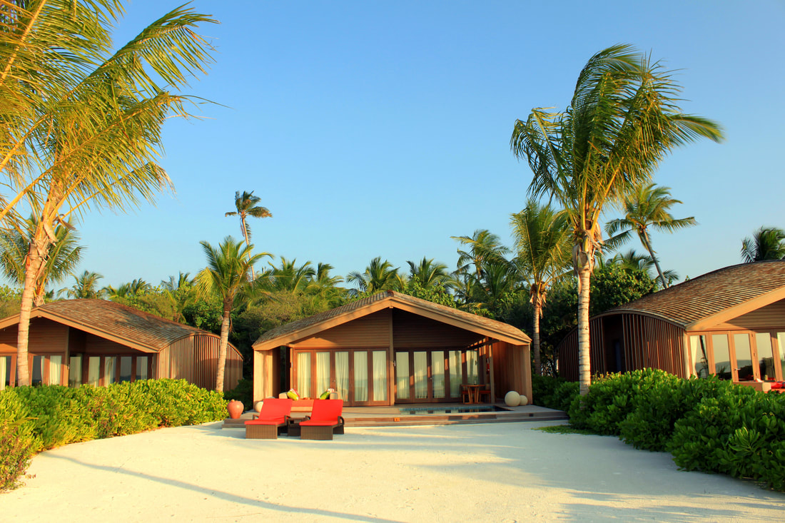Contemporary architecture and Japanese design for luxury beach villas at a Maldives island resort which is fully sustainable