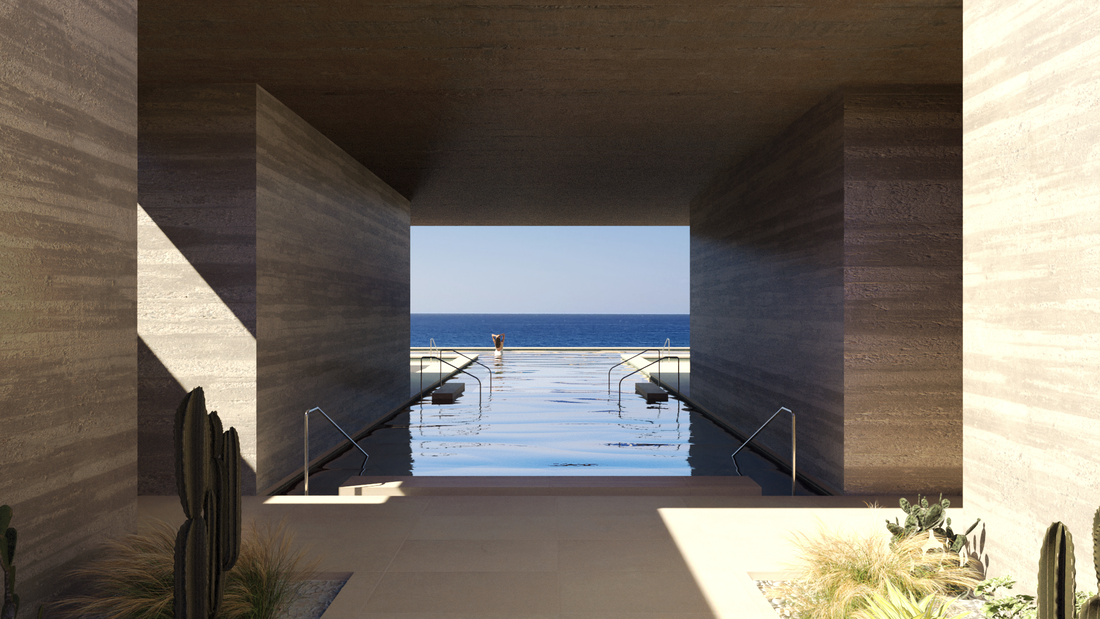 Rammed earth spa architecture at a high end Mexican beach hotel infinity pool looking out to the Pacific ocean