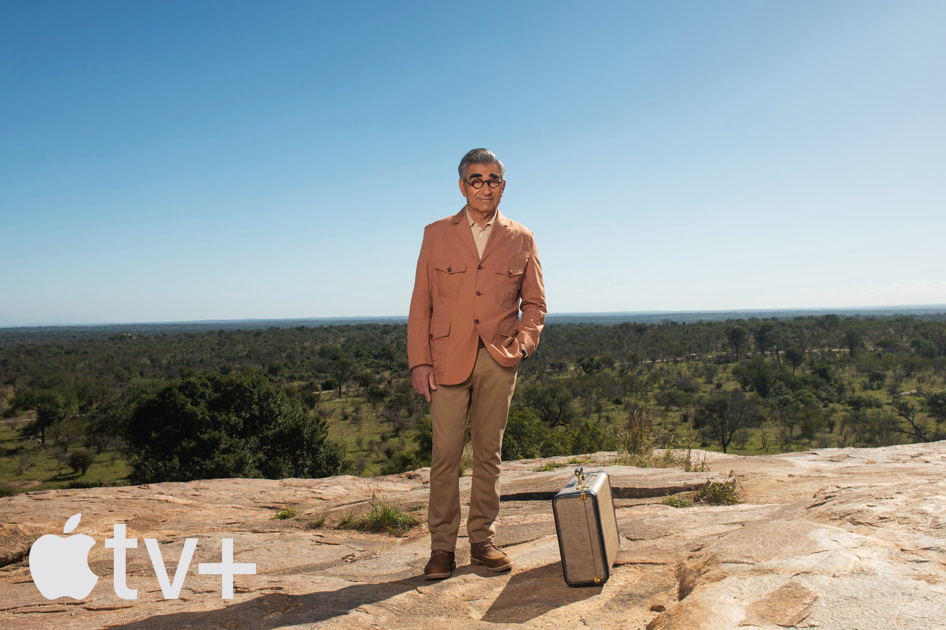 Actor Eugene Levy standing on a cliff for promotion of his TV show 